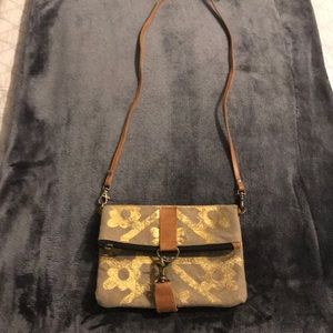 Crossbody bag made out of recycled army tents!